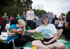 Sweet Briar students Taneal Williams (left), Ally Booth and Christina Seat comfort each other during the silent protest on Friday, a month after the school made the announcement it is closing.