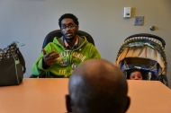 With his daughter, Sapphire, curiously looking on, Paul Gayle explains to social worker Alphonso Pettis about being thrown out of his mother's house after a disagreement. At 19, he possessed what few other black men in his neighborhood did: He was among the 42 percent with no criminal record; the 35 percent with a high school diploma; and the 14 percent of fathers who lived with their child. “A master at barely avoiding disaster,” his mother said of him, but she had said the same thing about Paul’s father until he was shot and killed during an argument at 39, when Paul was in eighth grade.