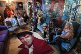 Mary Stonebraker sits in the living room of her home that is directly behind Elvis Presley's Graceland on Friday August 11, 2017 in Memphis, TN. She and her husband, Bud Stonebraker have lived in the home for 22 years. Bud refers to he and his wife as more Elvis fanatics than just fans. Their house is decked out with Elvis memorabilia. They hosted free concerts in their backyard during Elvis Week.