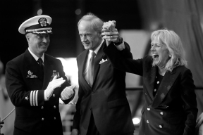 Jill Biden, right, celebrates with Senator Thomas Carper, center, and Commander Brian Hogan, left after smashing a bottle of sparkling wine during the christening ceremony for the submarine Delaware at Newport News Shipbuilding Saturday morning October 20, 2018. Delaware will be the ninth Virginia-class submarine that Newport News has delivered and 18th in the entire class.