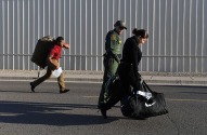 New trainees carry their luggage to their dorms at the United States Border Patrol Academy on Wednesday August 29, 2018 in Artesia, NM. The academy is on the grounds of the Federal Law Enforcement Training Center.