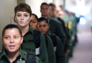 Erin Herrgott, 20, of Oxford, MI, top left, lines up with fellow new trainees at the United States Border Patrol Academy on Friday August 31, 2018 in Artesia, NM. The academy is on the grounds of the Federal Law Enforcement Training Center.