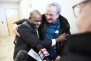 Ansly Damus hugs Gary Benjamin after Ansly was released from an ICE facility on Friday November 30, 2018 in Brooklyn Heights, OH. Damus, who is from Haiti has been detained since 2016 after coming to the United States to seek asylum. Ansly was released on Friday to live with Benjamin and his wife, Melody Hart.